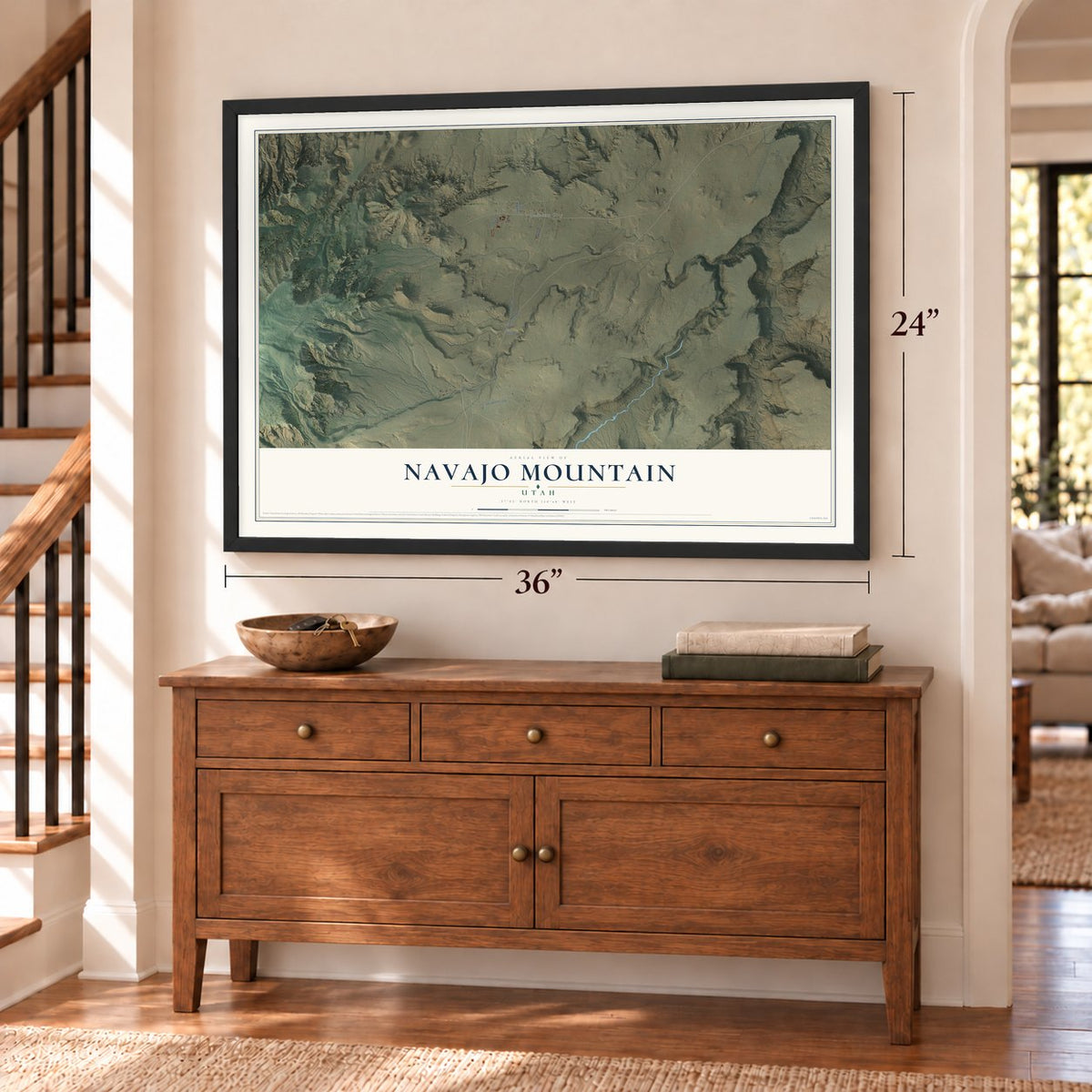 Navajo Mountain, Utah map, 24 x 36 inch print in a black frame above a dresser by a staircase