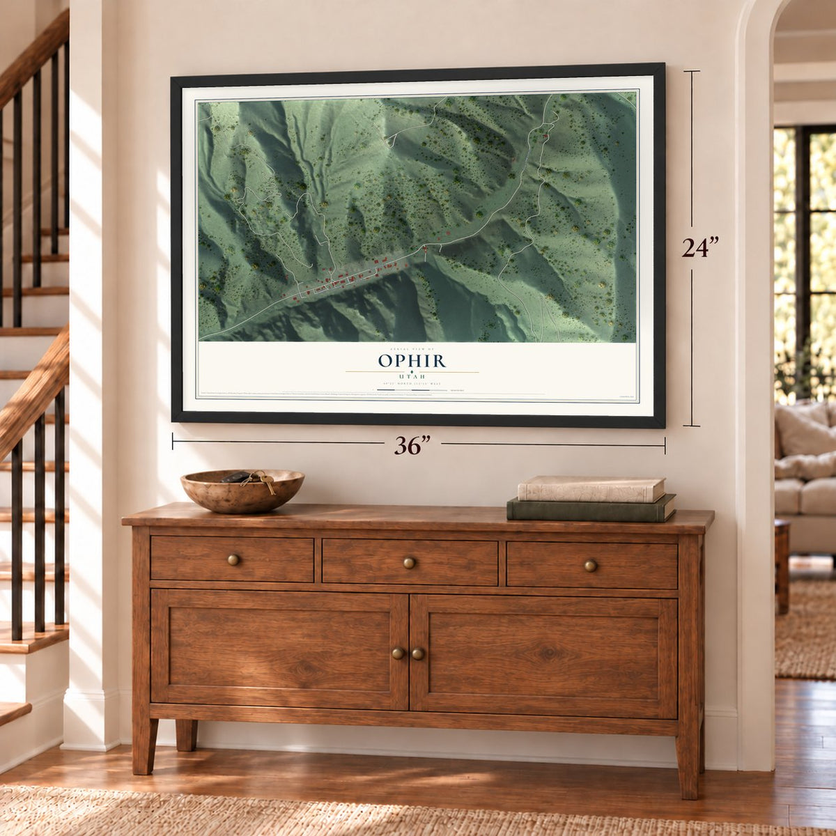 Ophir, Utah map, 24 x 36 inch print in a black frame above a dresser by a staircase