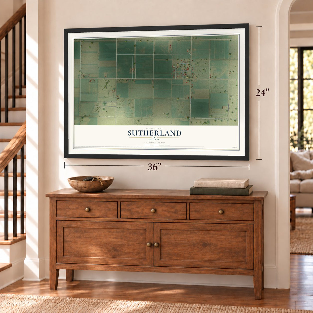 Sutherland, Utah map, 24 x 36 inch print in a black frame above a dresser by a staircase