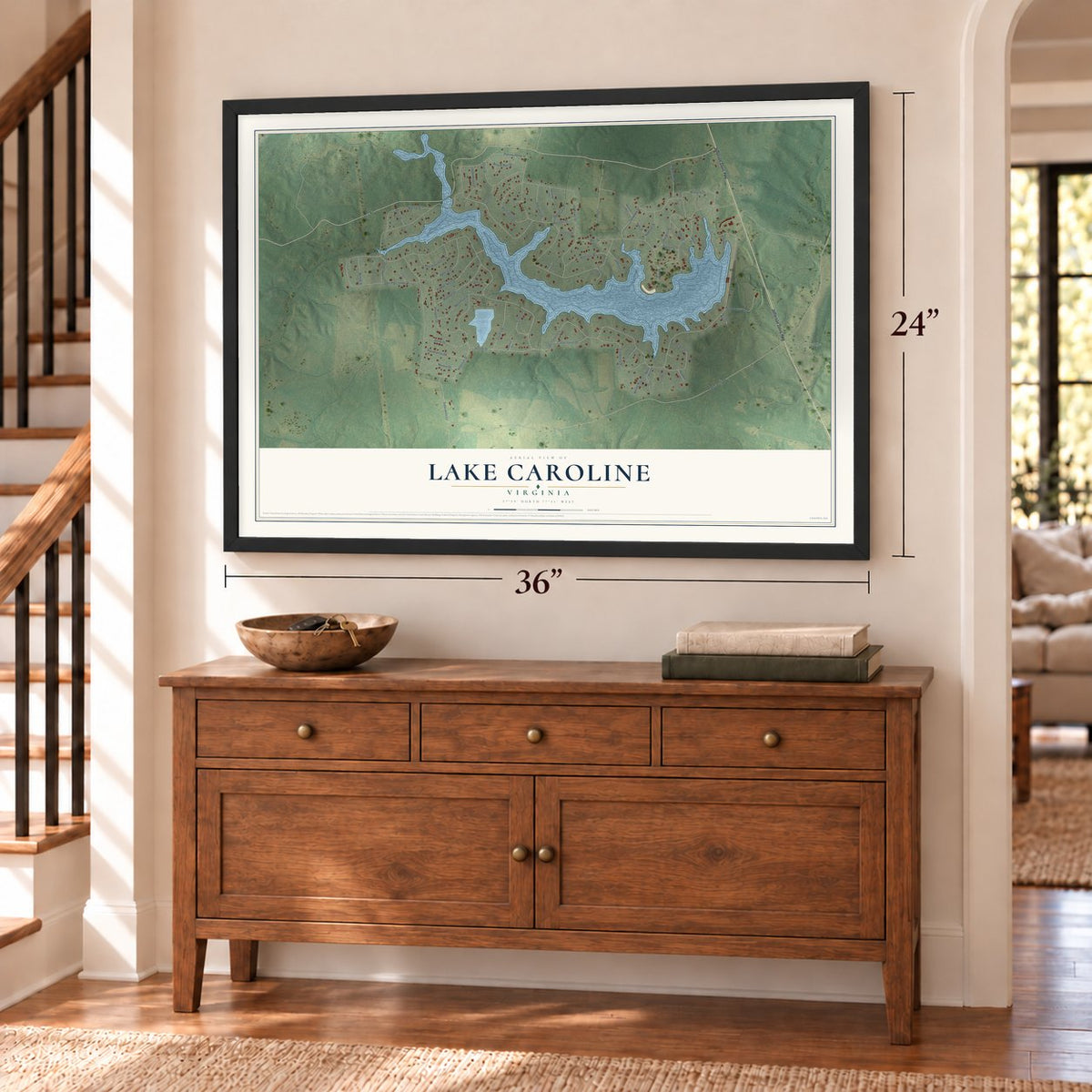 Lake Caroline, Virginia map, 24 x 36 inch print in a black frame above a dresser by a staircase