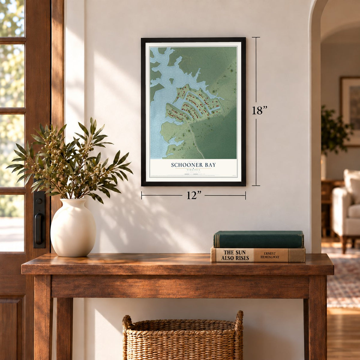 Schooner Bay, Virginia map, 12 x 18 inch print in a black frame in an entryway