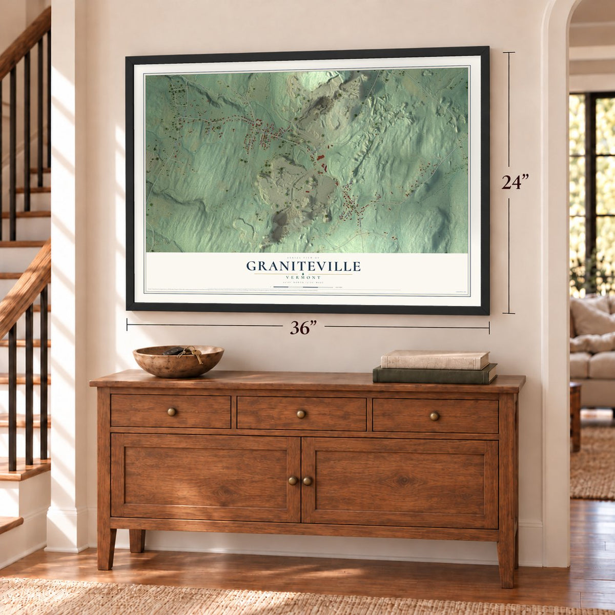 Graniteville, Vermont map, 24 x 36 inch print in a black frame above a dresser by a staircase