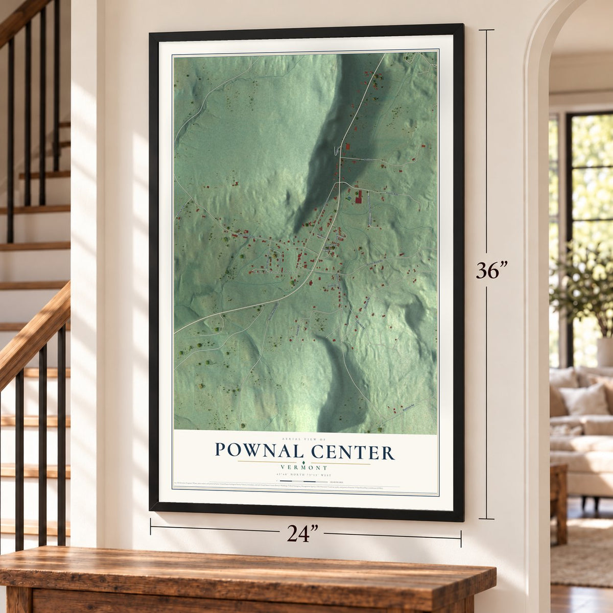 Pownal Center, Vermont map, 24 x 36 inch print in a black frame by a staircase