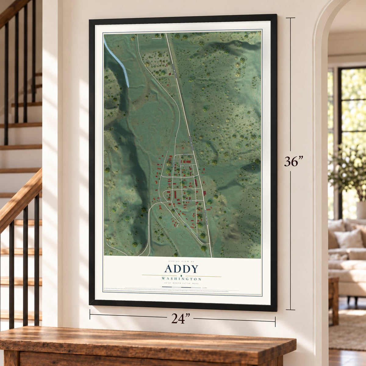 Addy, Washington map, 24 x 36 inch print in a black frame by a staircase