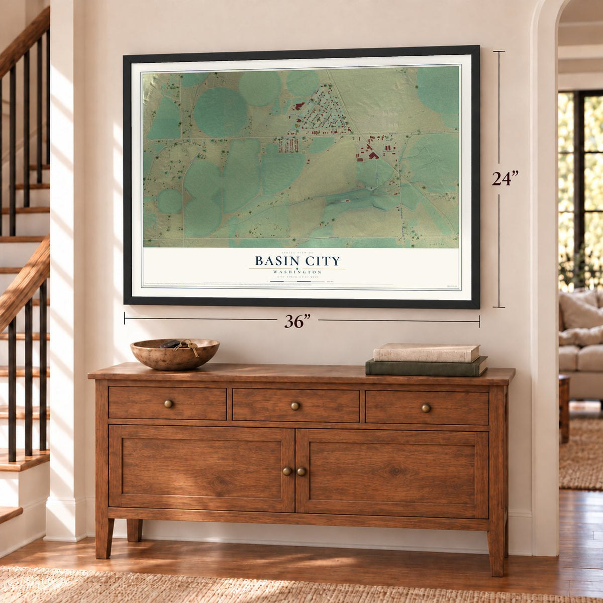 Basin City, Washington map, 24 x 36 inch print in a black frame above a dresser by a staircase