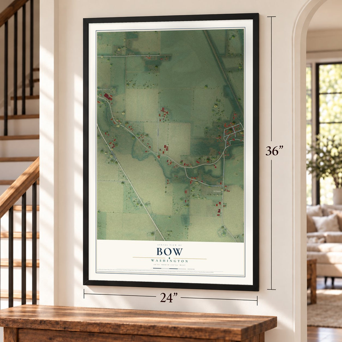 Bow, Washington map, 24 x 36 inch print in a black frame by a staircase