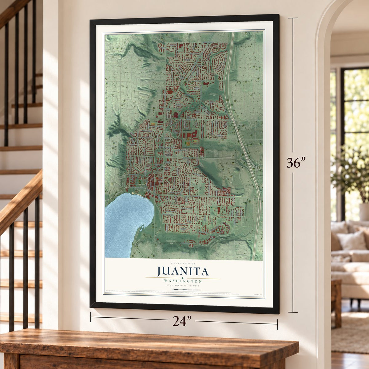 Juanita, Washington map, 24 x 36 inch print in a black frame by a staircase