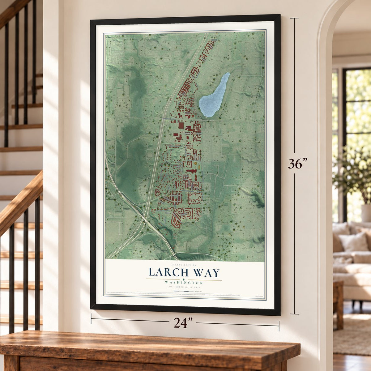 Larch Way, Washington map, 24 x 36 inch print in a black frame by a staircase