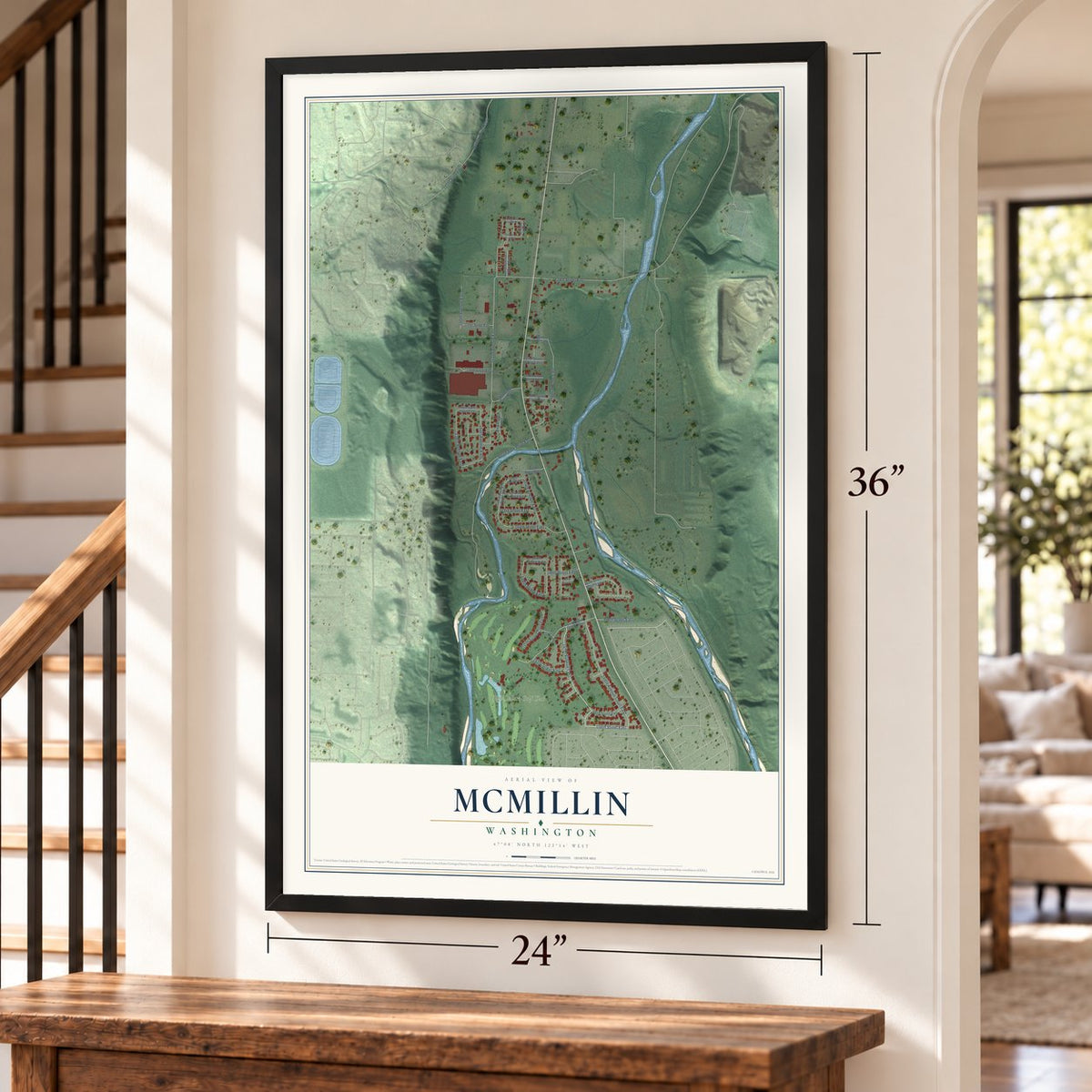 McMillin, Washington map, 24 x 36 inch print in a black frame by a staircase