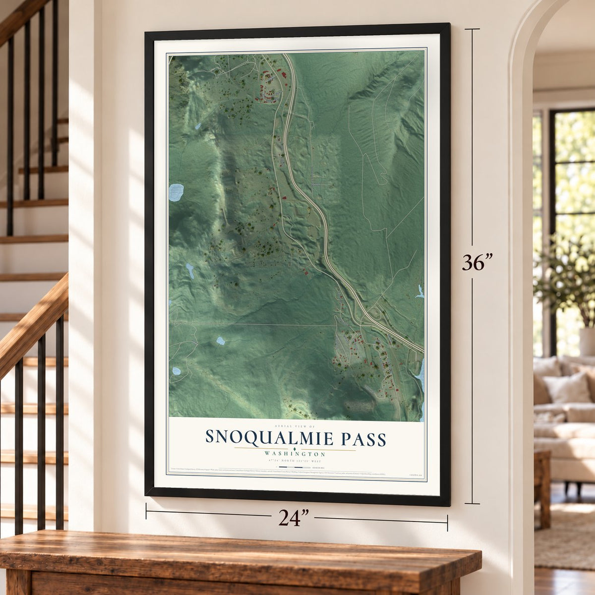 Snoqualmie Pass, Washington map, 24 x 36 inch print in a black frame by a staircase
