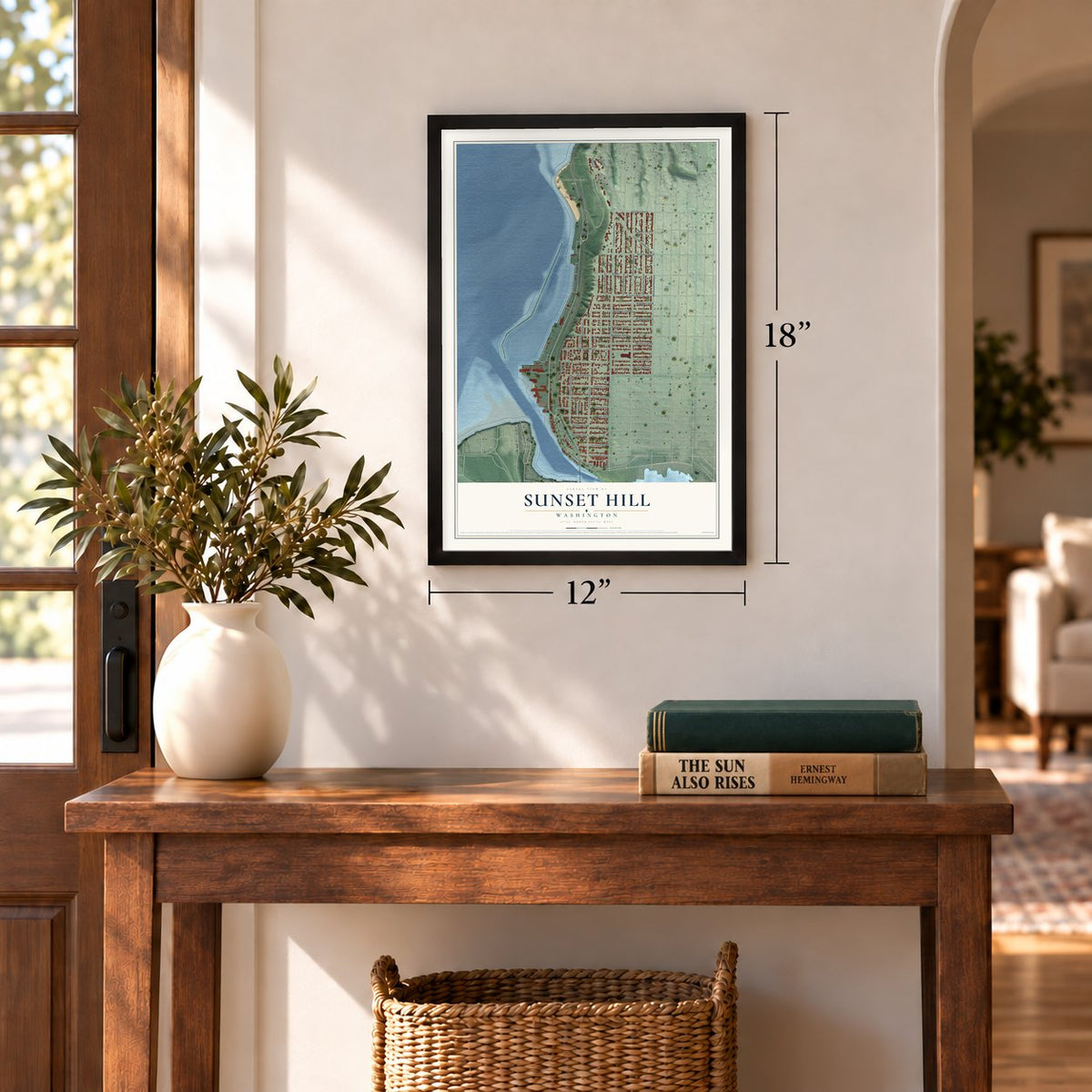 Sunset Hill, Washington map, 12 x 18 inch print in a black frame in an entryway