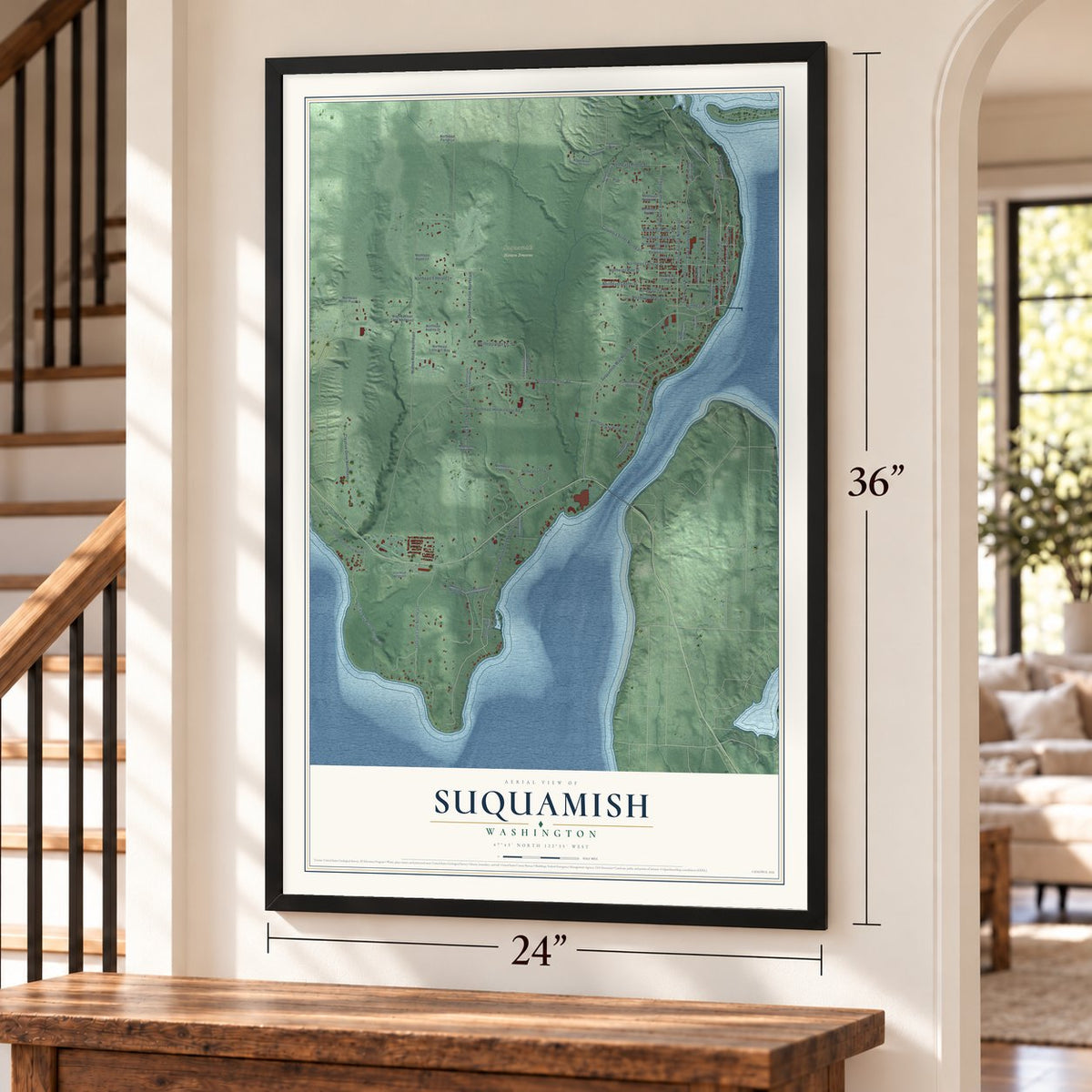Suquamish, Washington map, 24 x 36 inch print in a black frame by a staircase