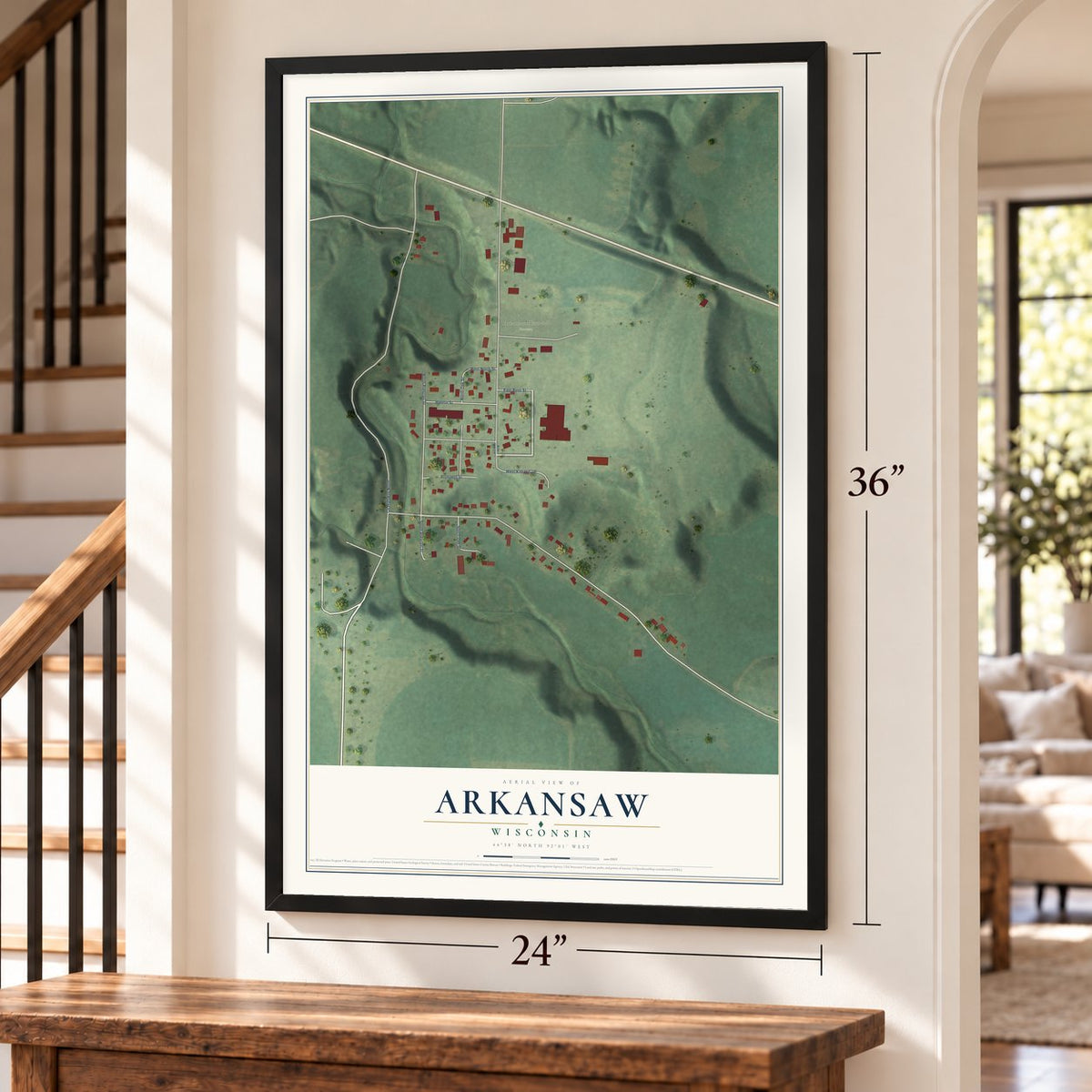 Arkansaw, Wisconsin map, 24 x 36 inch print in a black frame by a staircase
