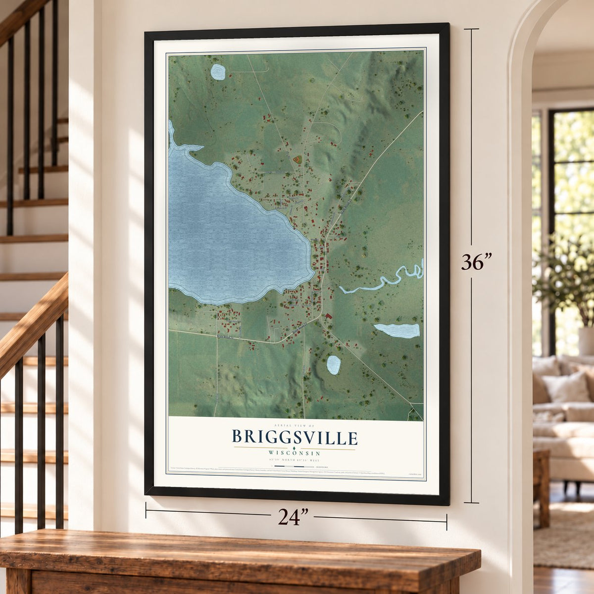 Briggsville, Wisconsin map, 24 x 36 inch print in a black frame by a staircase