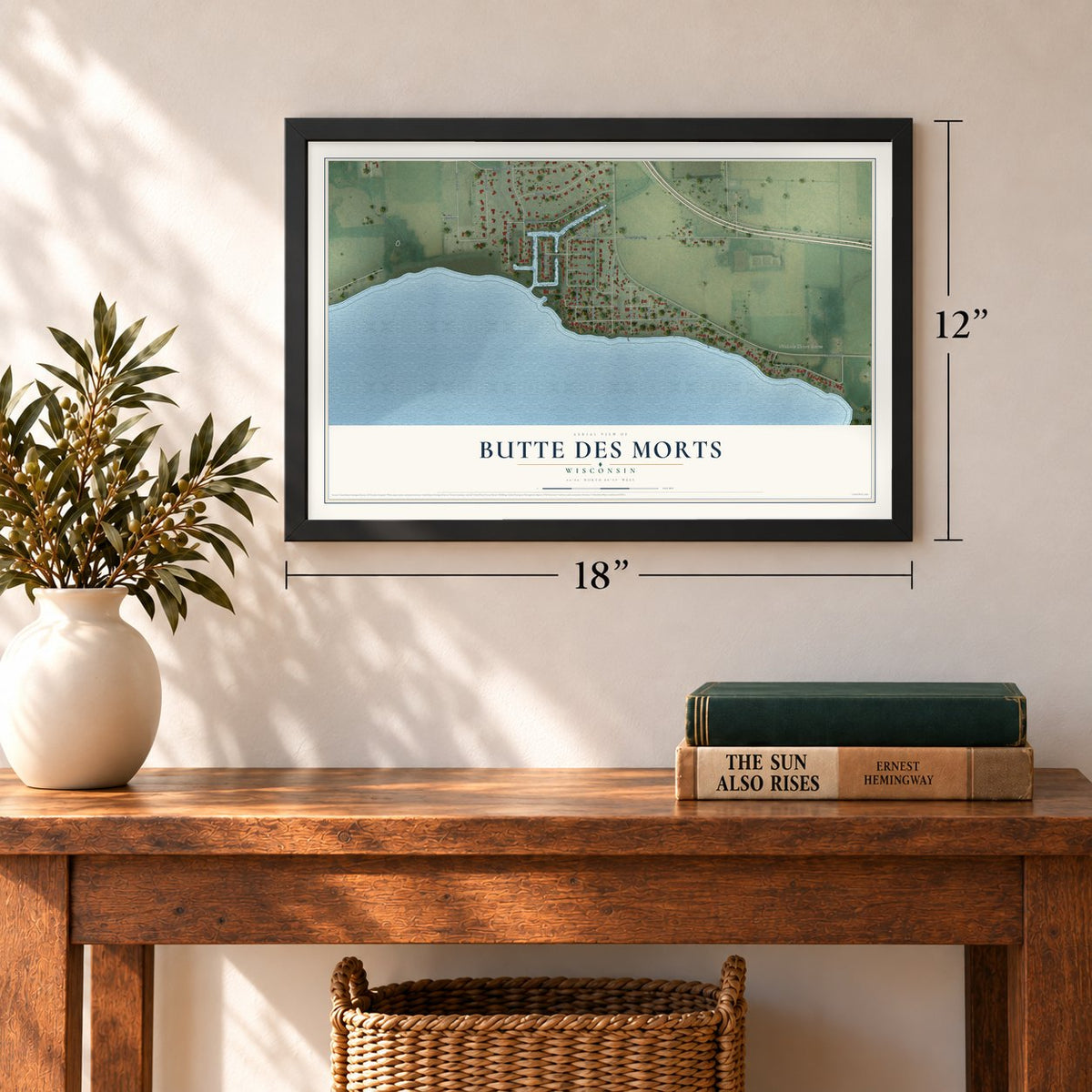 Butte des Morts, Wisconsin map, 12 x 18 inch print in a black frame in an entryway