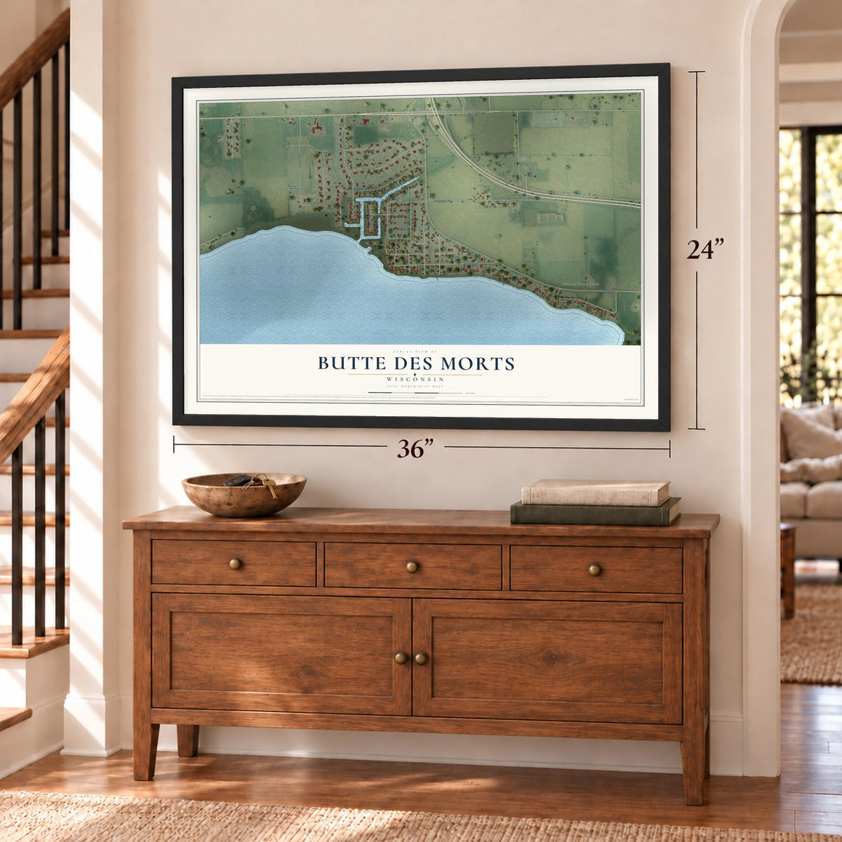 Butte des Morts, Wisconsin map, 24 x 36 inch print in a black frame above a dresser by a staircase