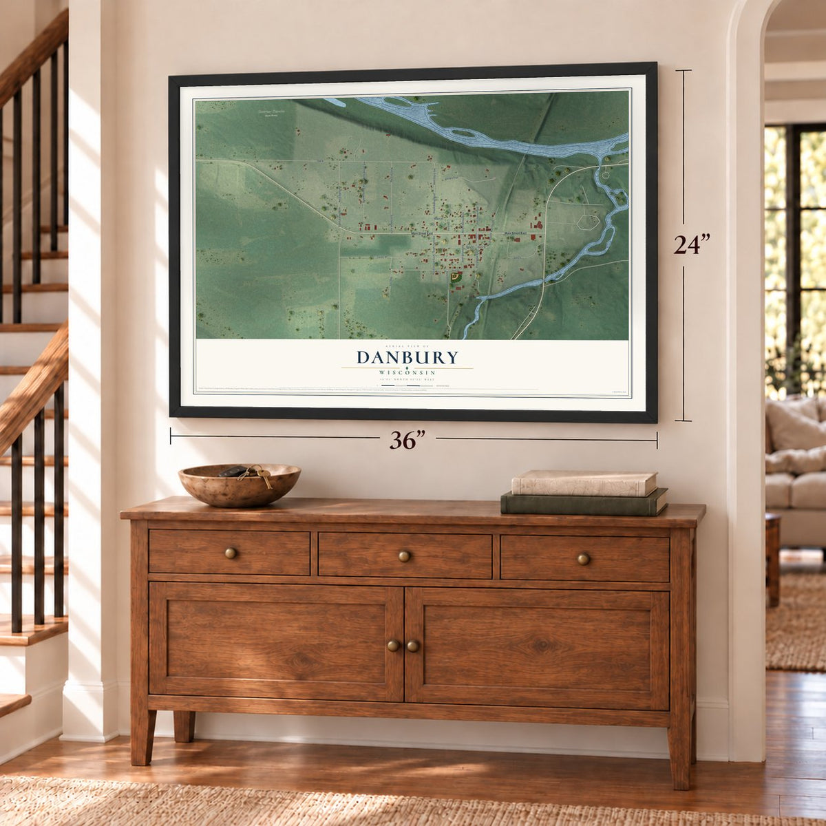 Danbury, Wisconsin map, 24 x 36 inch print in a black frame above a dresser by a staircase