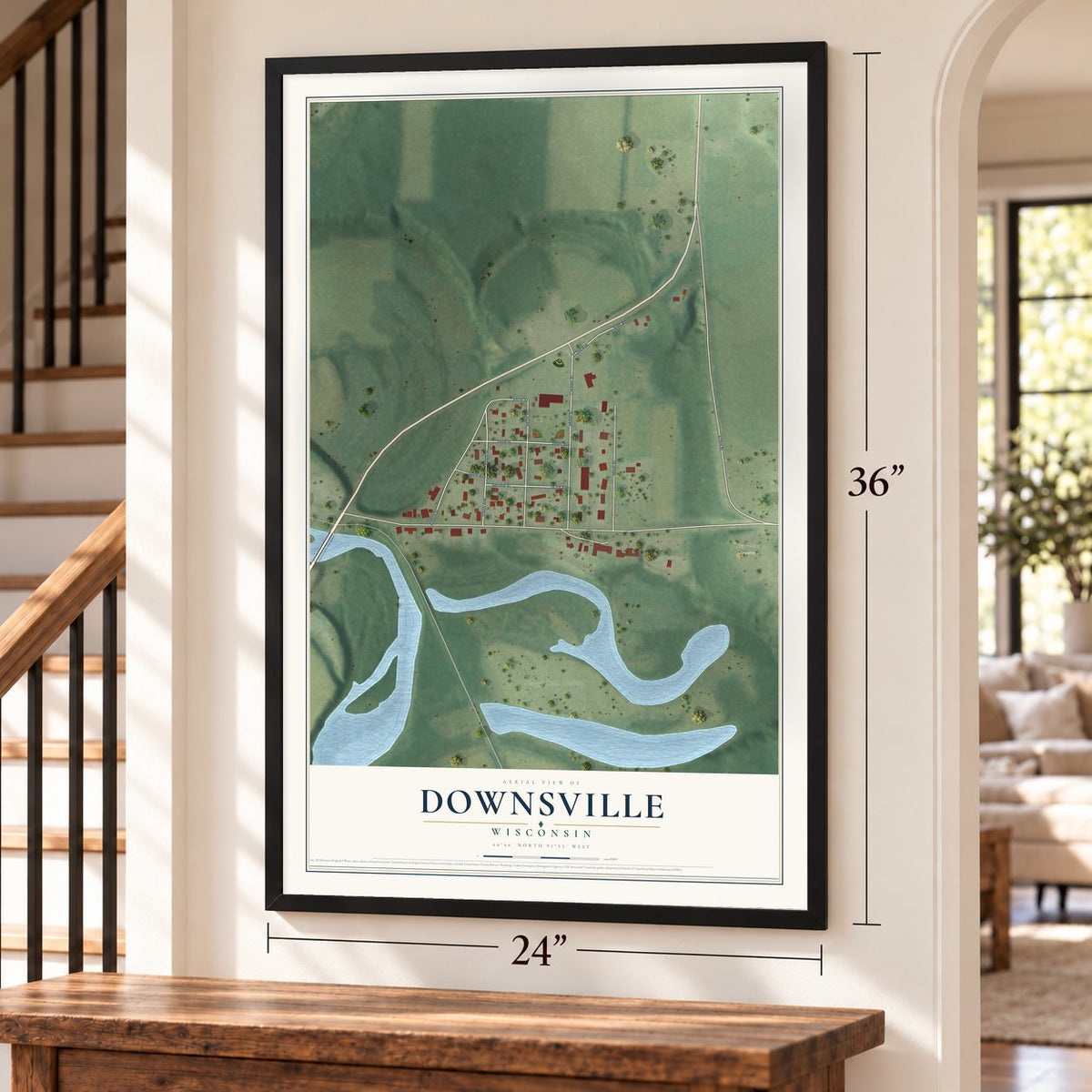 Downsville, Wisconsin map, 24 x 36 inch print in a black frame by a staircase