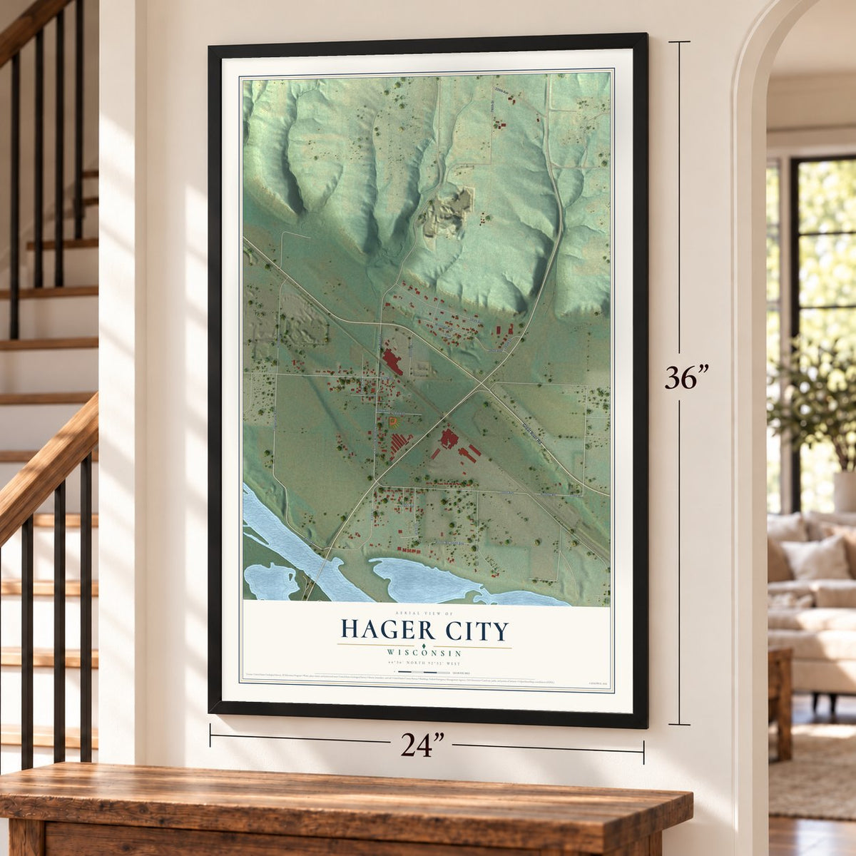 Hager City, Wisconsin map, 24 x 36 inch print in a black frame by a staircase