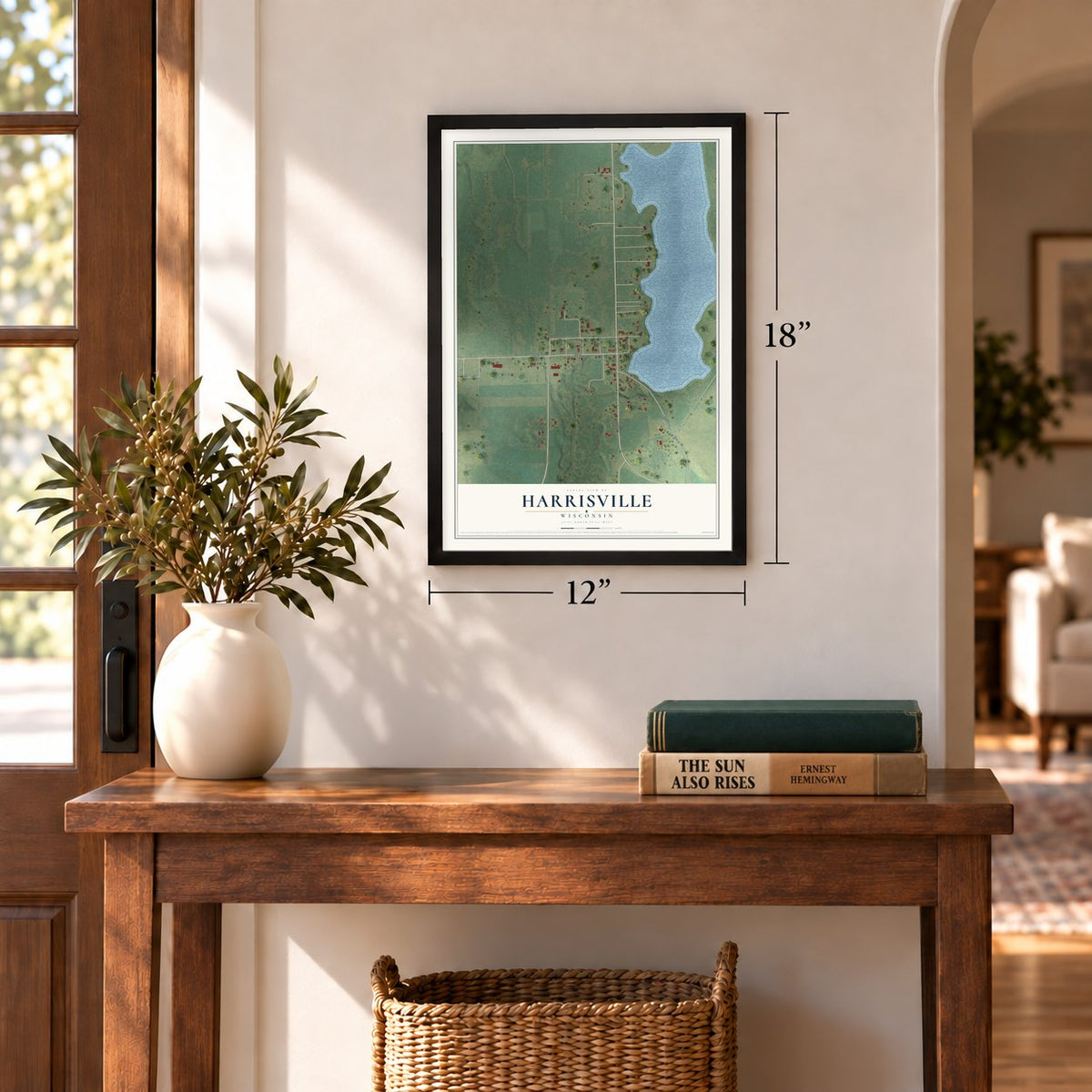 Harrisville, Wisconsin map, 12 x 18 inch print in a black frame in an entryway