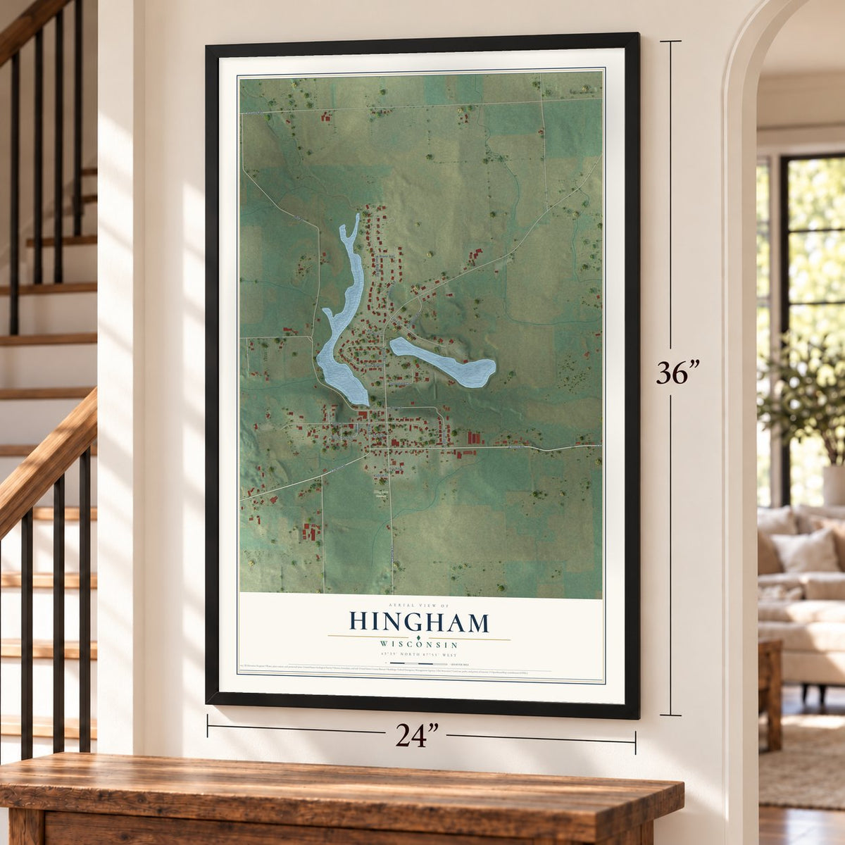 Hingham, Wisconsin map, 24 x 36 inch print in a black frame by a staircase