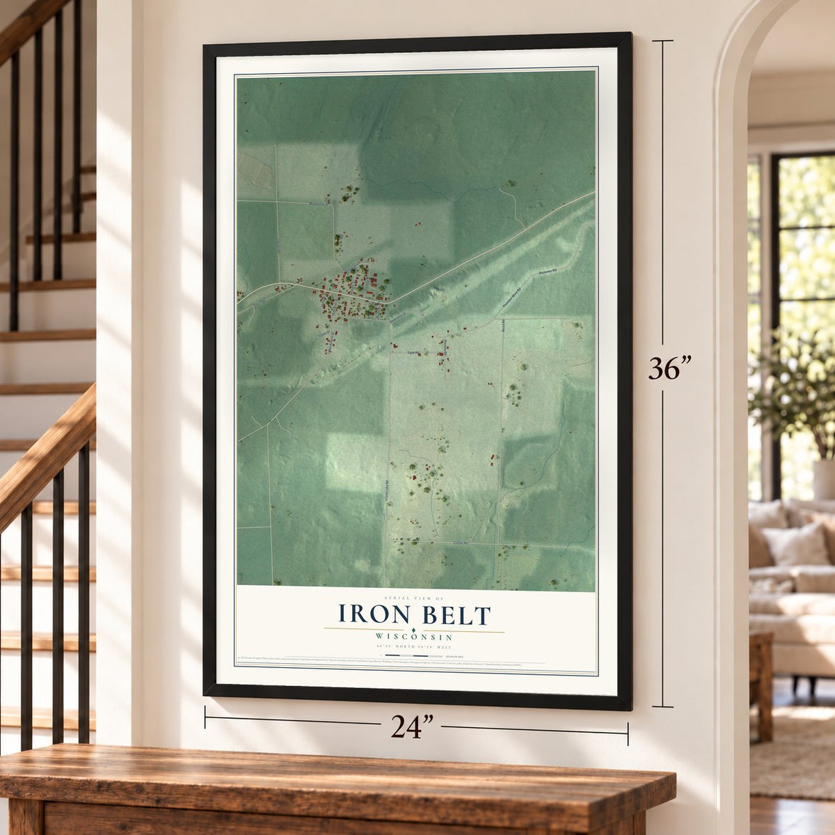 Iron Belt, Wisconsin map, 24 x 36 inch print in a black frame by a staircase