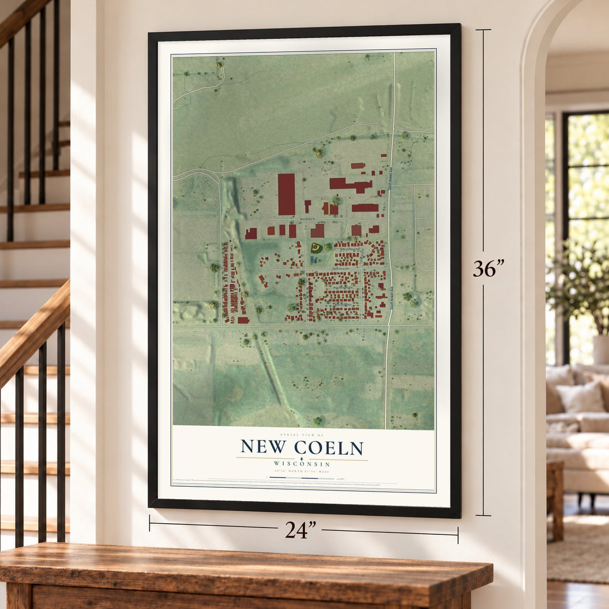 New Coeln, Wisconsin map, 24 x 36 inch print in a black frame by a staircase