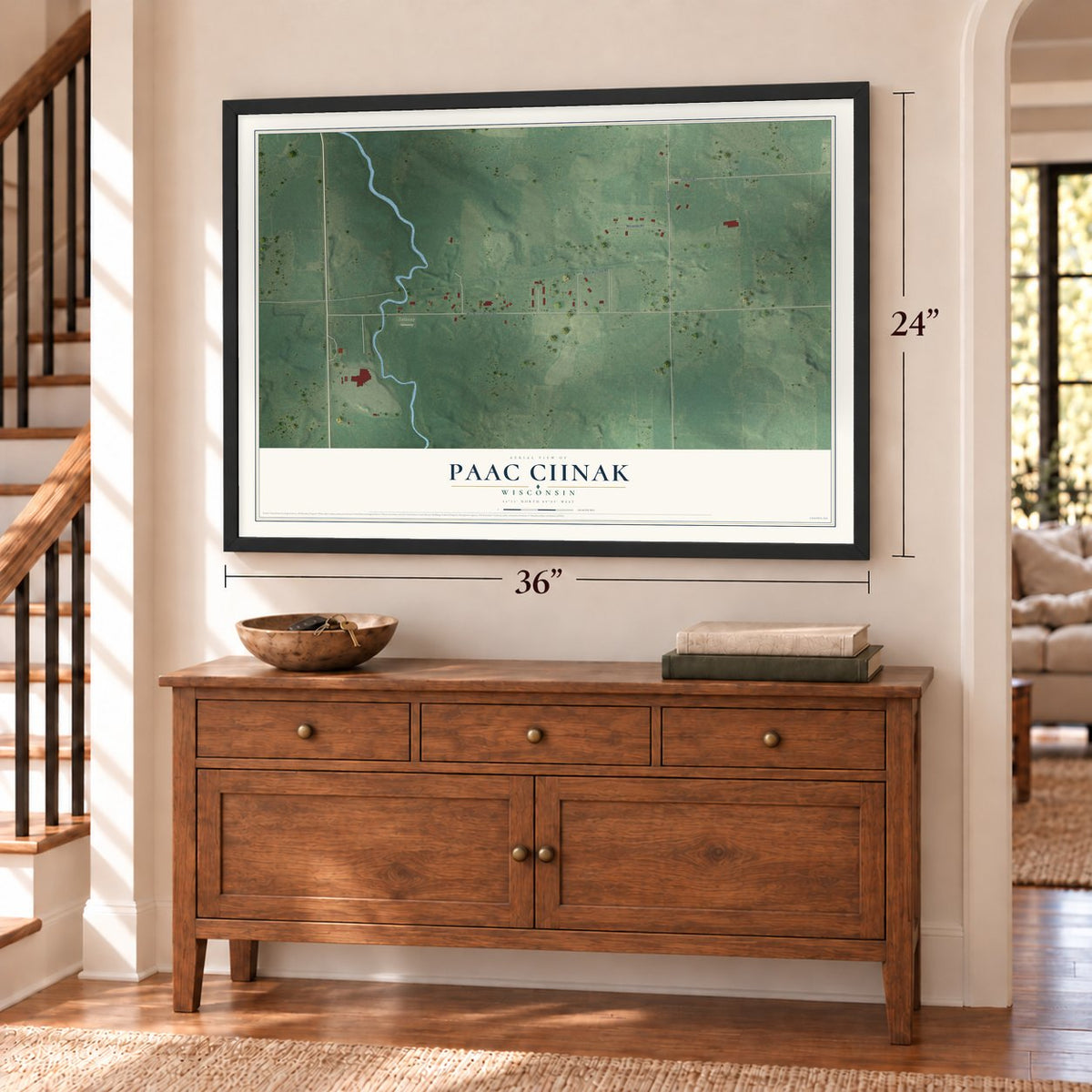 Paac Ciinak, Wisconsin map, 24 x 36 inch print in a black frame above a dresser by a staircase