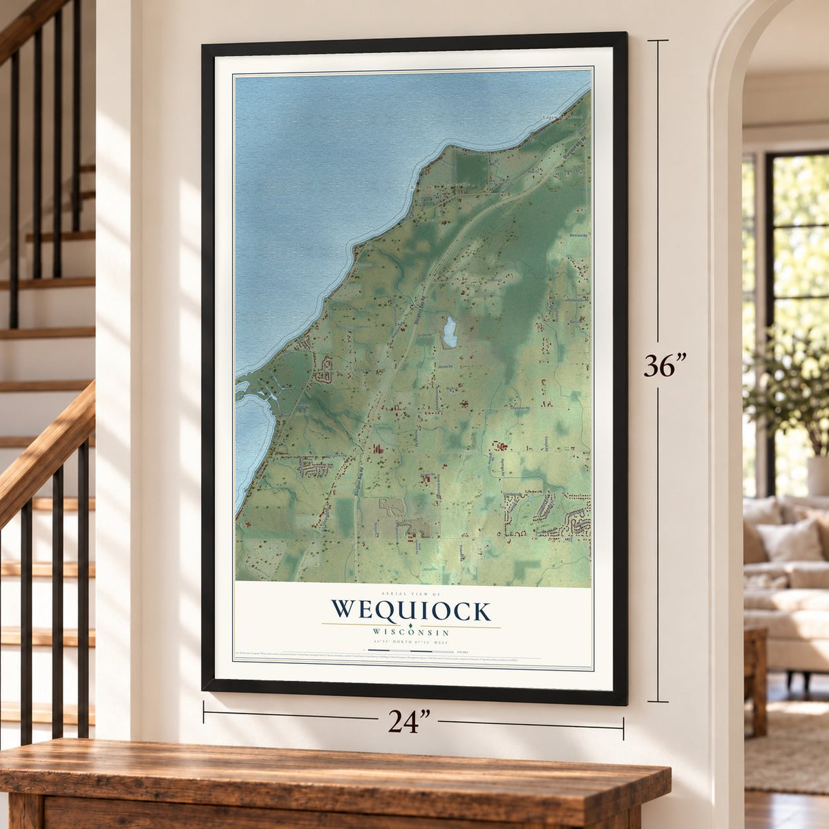 Wequiock, Wisconsin map, 24 x 36 inch print in a black frame by a staircase