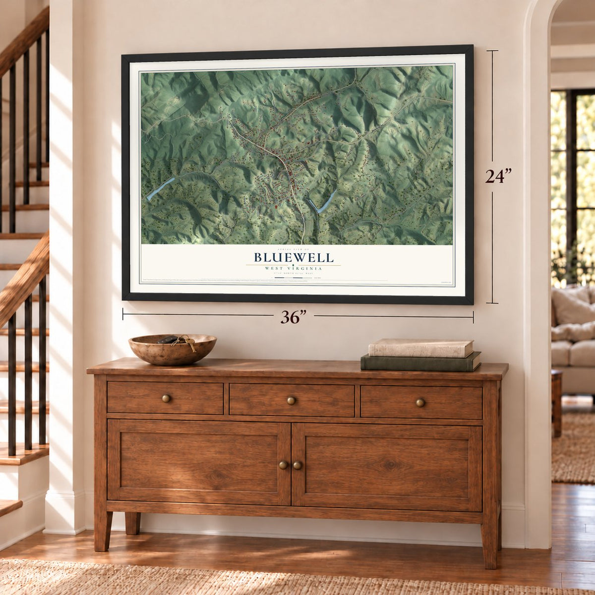 Bluewell, West Virginia map, 24 x 36 inch print in a black frame above a dresser by a staircase