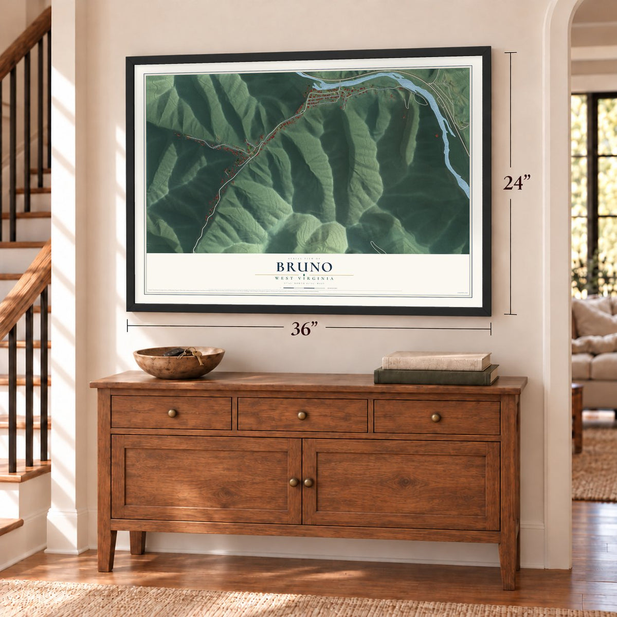 Bruno, West Virginia map, 24 x 36 inch print in a black frame above a dresser by a staircase