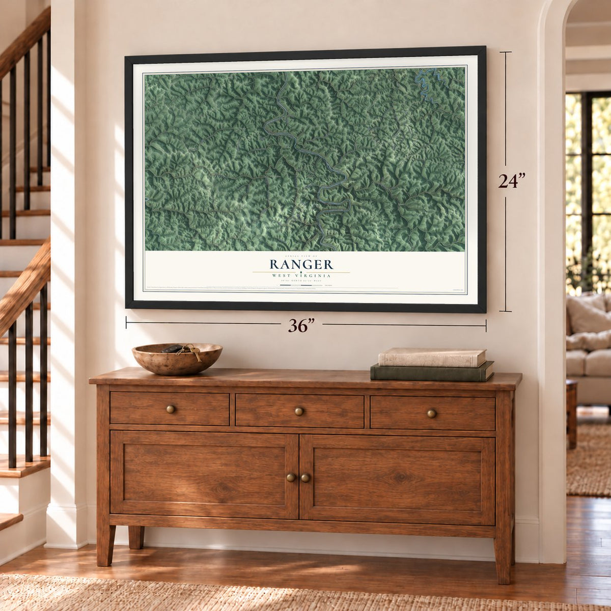 Ranger, West Virginia map, 24 x 36 inch print in a black frame above a dresser by a staircase