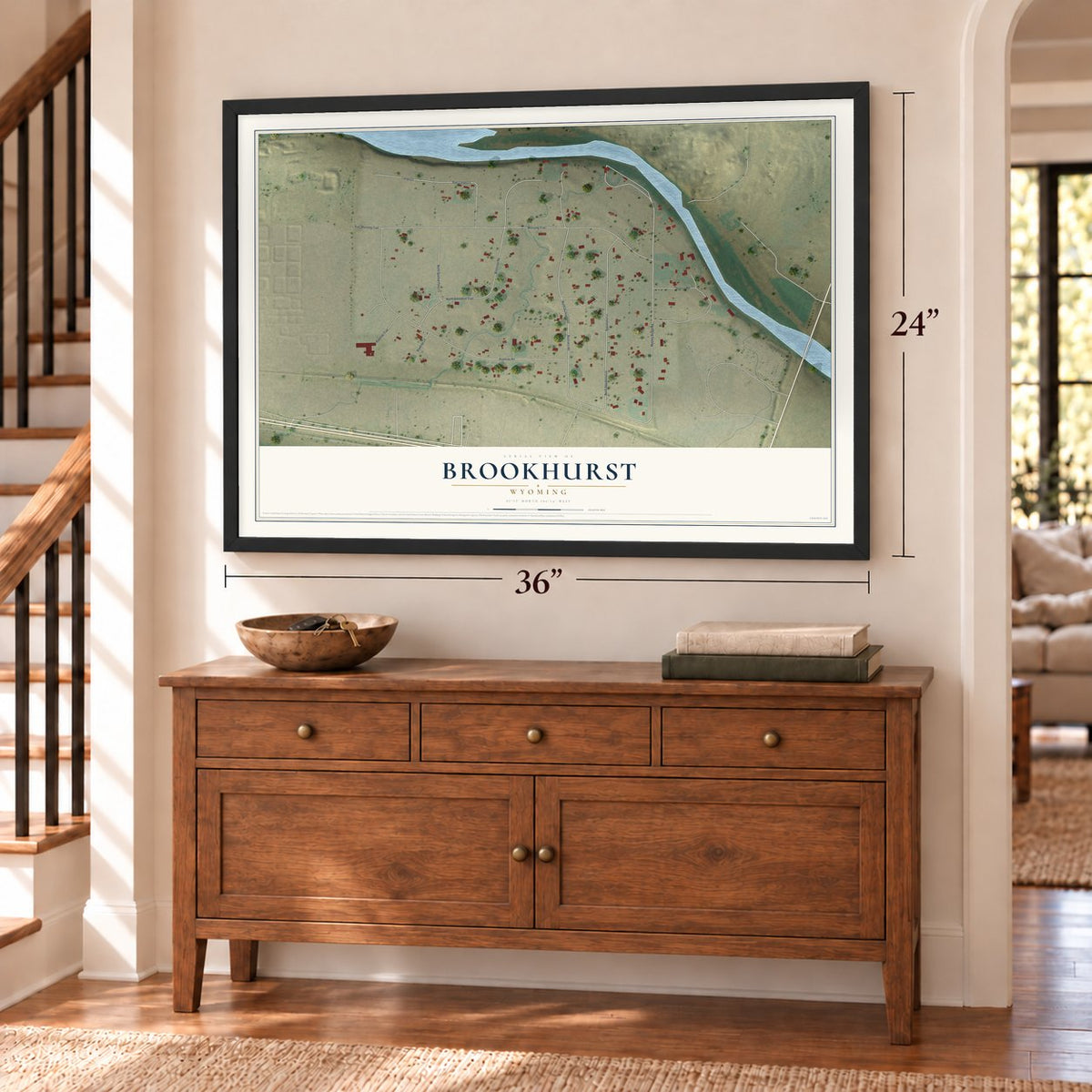 Brookhurst, Wyoming map, 24 x 36 inch print in a black frame above a dresser by a staircase