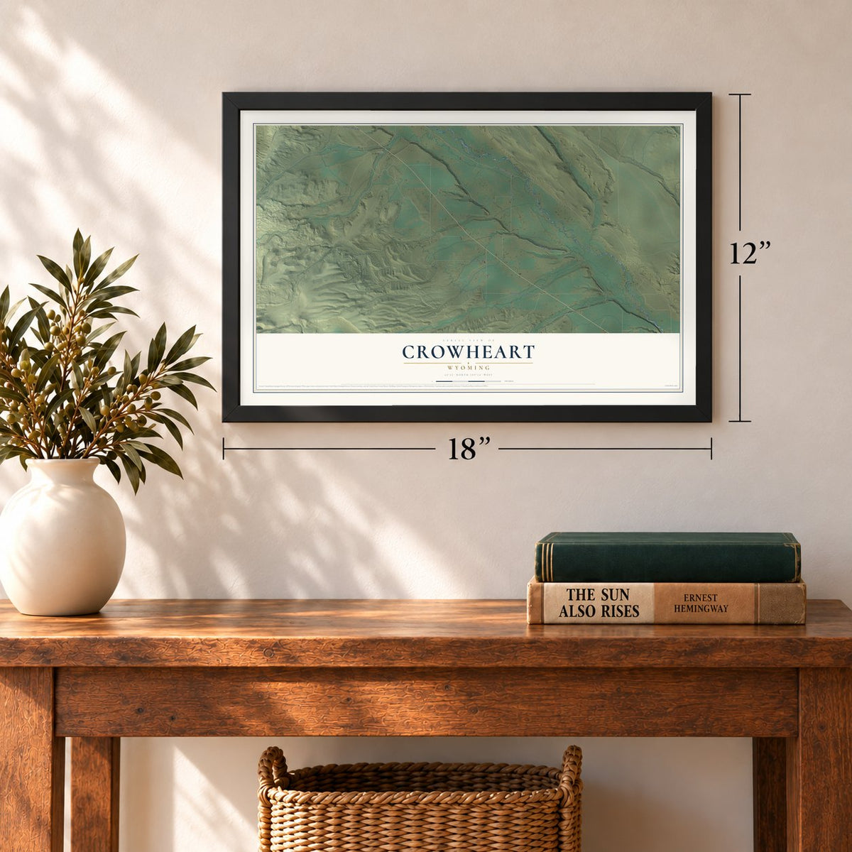 Crowheart, Wyoming map, 12 x 18 inch print in a black frame in an entryway