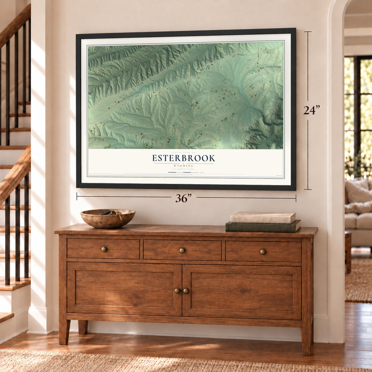 Esterbrook, Wyoming map, 24 x 36 inch print in a black frame above a dresser by a staircase