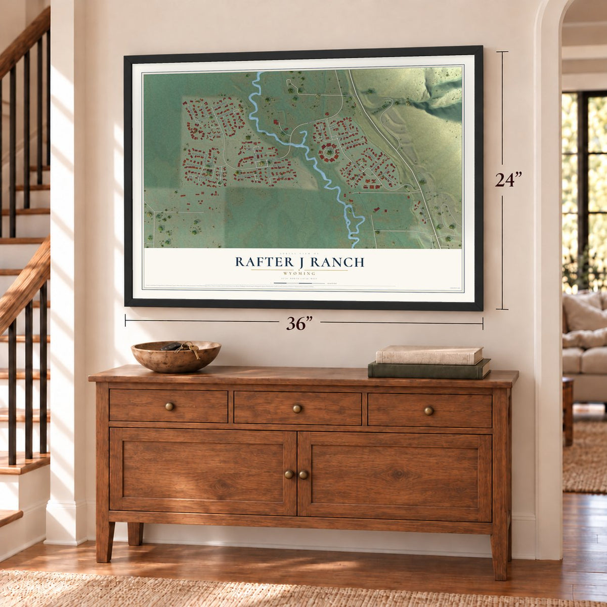 Rafter J Ranch, Wyoming map, 24 x 36 inch print in a black frame above a dresser by a staircase