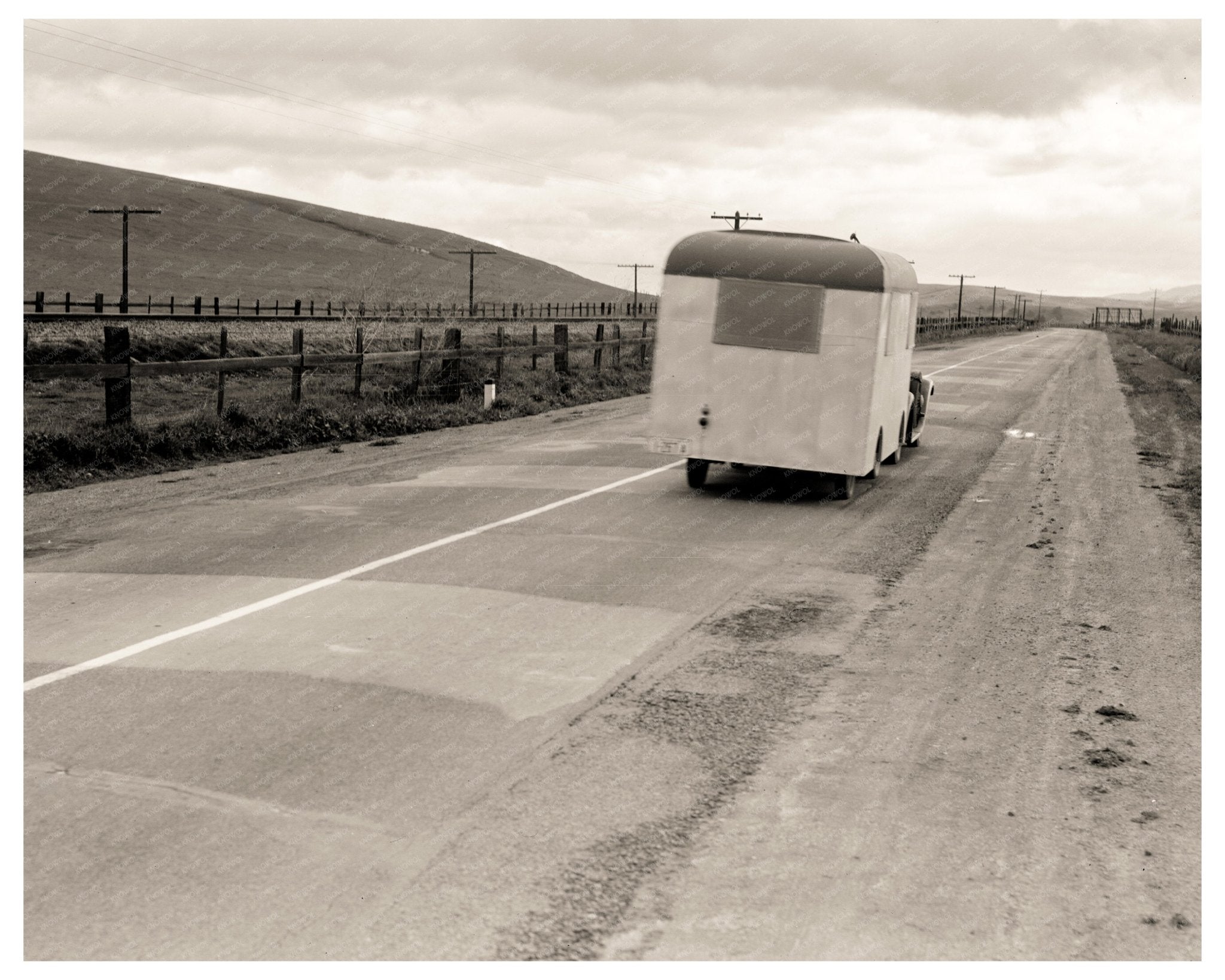 Middle - Aged Couple in Homemade Trailer U.S. 101 King City California February 1936 Vintage Photo - Available at KNOWOL