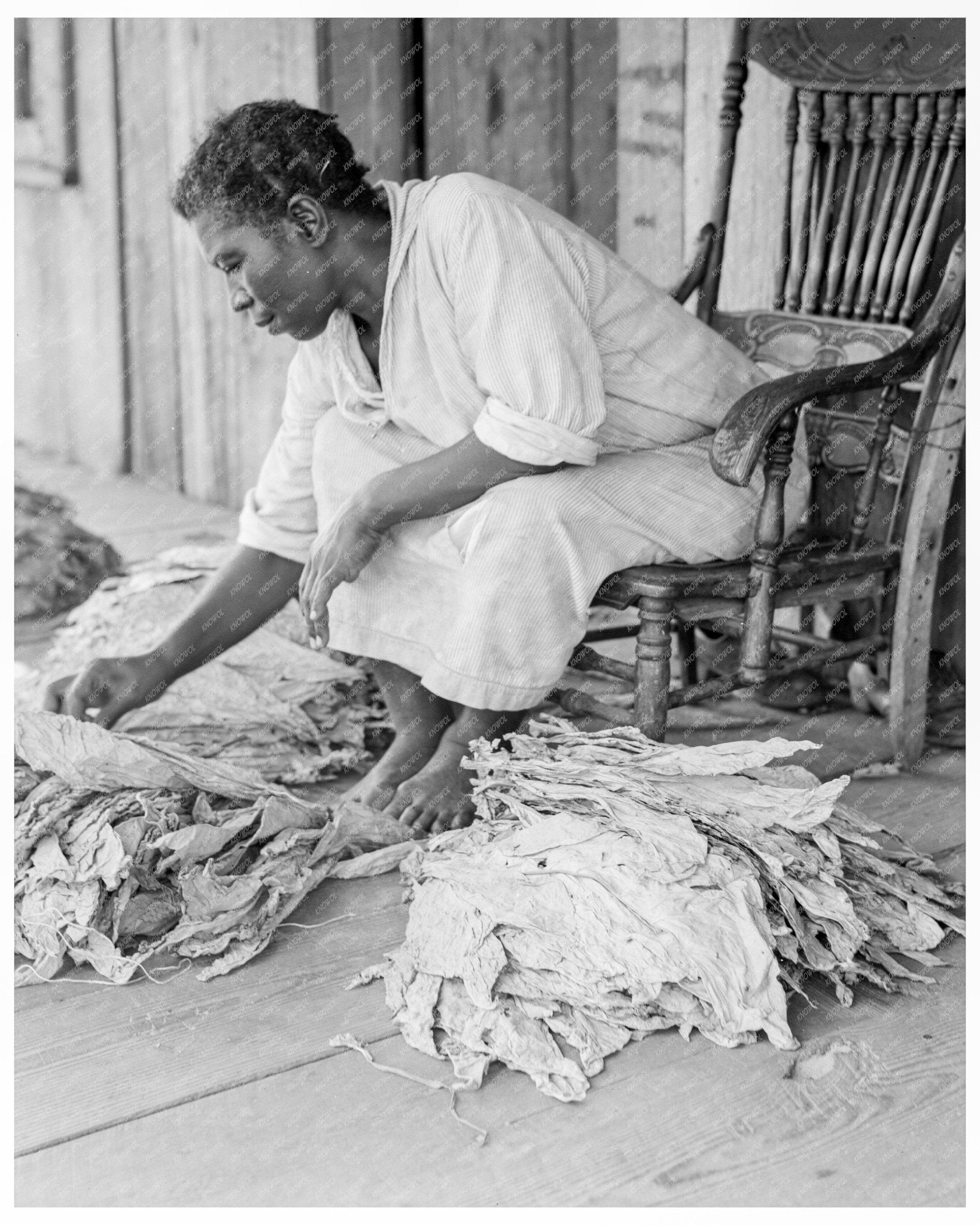 Vintage 1938 Photograph of Sharecropper Sorting Tobacco on Porch in Douglas Georgia - Available at KNOWOL