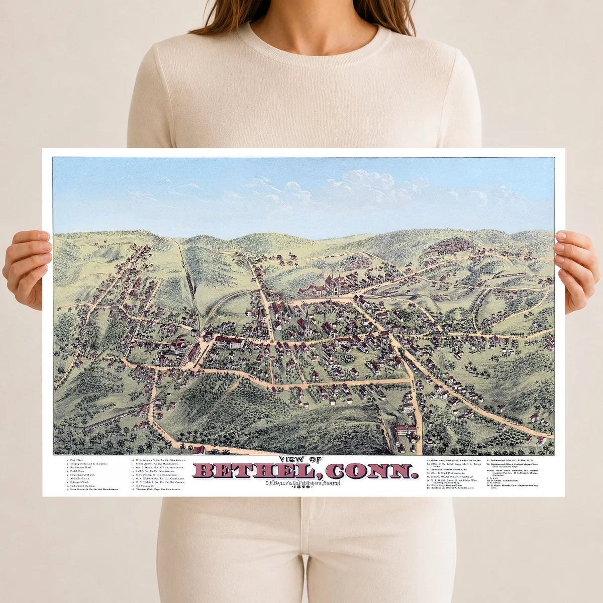 Restored and colorized 1879 bird’s-eye view map of Bethel, Connecticut by O.H. Bailey, showing historic streets, railroads, churches, factories, homes, and landmarks.
