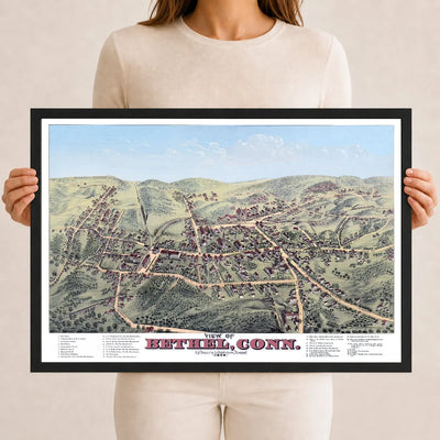Restored and colorized 1879 bird’s-eye view map of Bethel, Connecticut by O.H. Bailey, showing historic streets, railroads, churches, factories, homes, and landmarks.