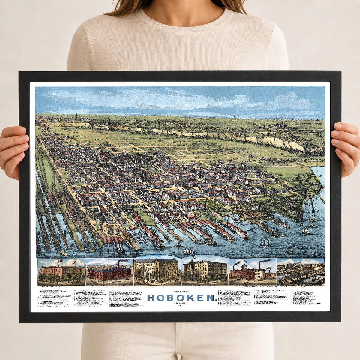 Restored and colorized 1881 bird’s-eye view map of Hoboken, New Jersey, showing historic streets, Hudson River waterfront, railroads, piers, steamers, churches, factories, homes, and landmarks.