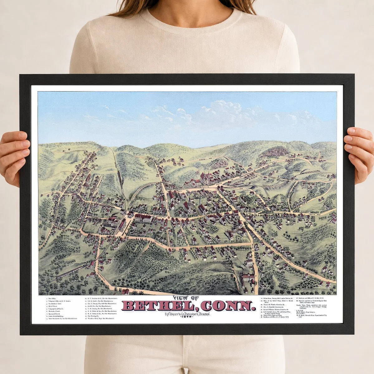 Restored and colorized 1879 bird’s-eye view map of Bethel, Connecticut by O.H. Bailey, showing historic streets, railroads, churches, factories, homes, and landmarks.