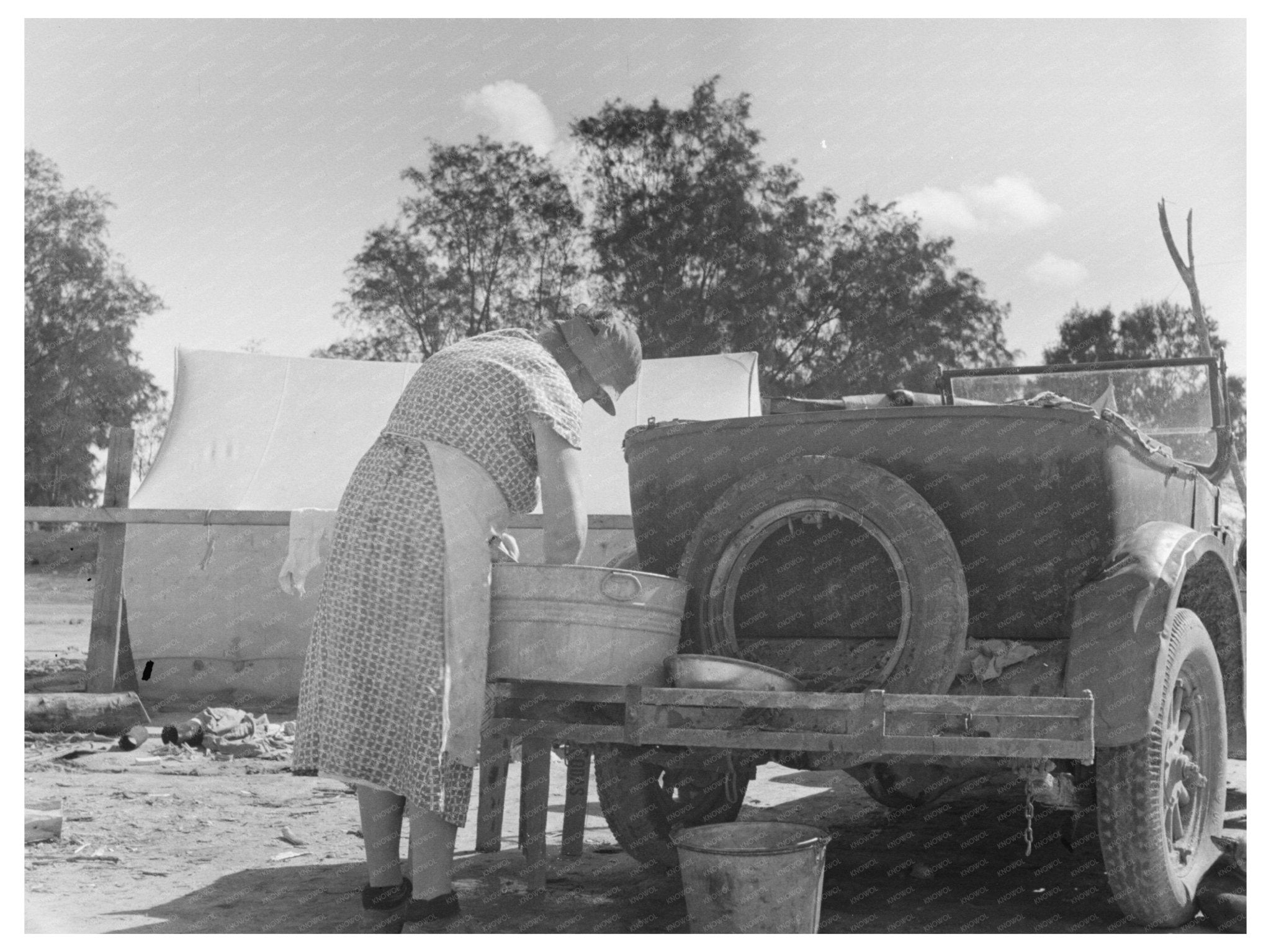 1936 Migrant Workers in California Participate in Blue Monday Laundry Tradition - Available at KNOWOL