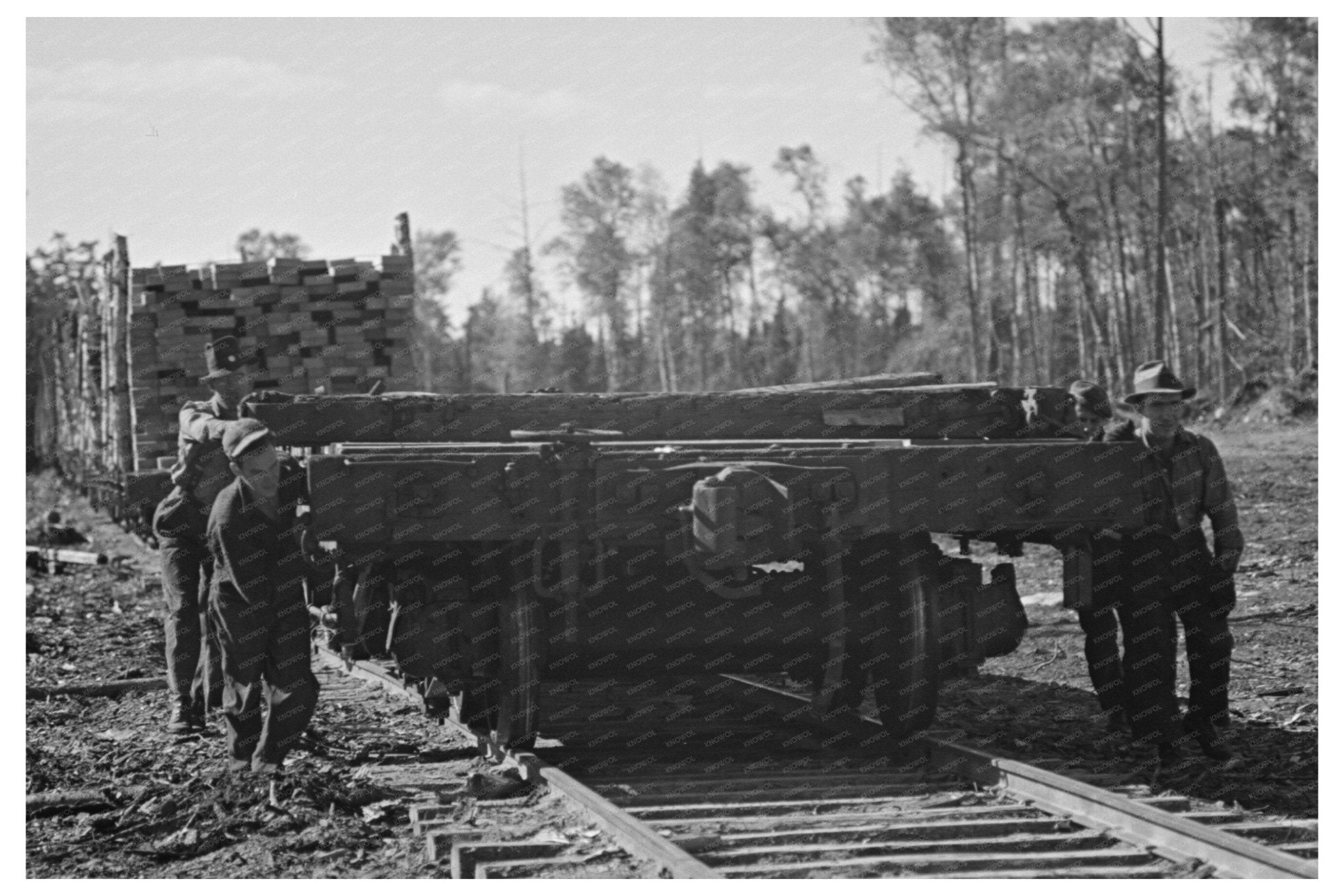 1937 Lumber Camp Loaders Pushing Logs Effie Minnesota - Available at KNOWOL