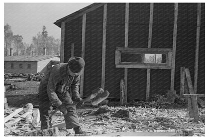 1937 Lumberjack Shaping Stake with Broadaxe in Minnesota - Available at KNOWOL