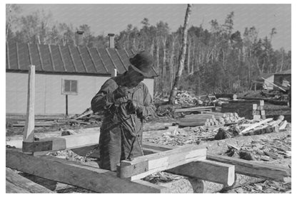 1937 Workers Drilling Sleds for Timber Transportation Effie MN - Available at KNOWOL