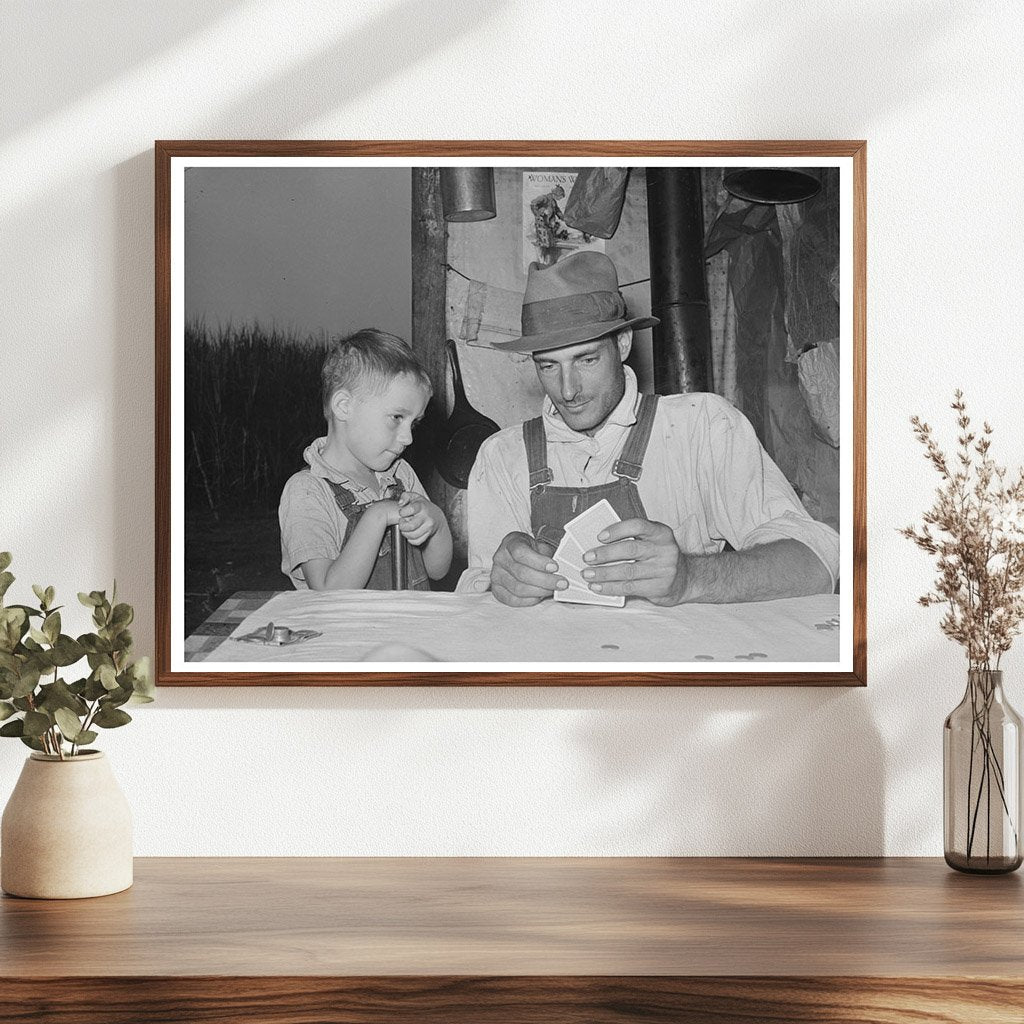 1938 Day Laborer and Son Playing Poker in Louisiana - Available at KNOWOL