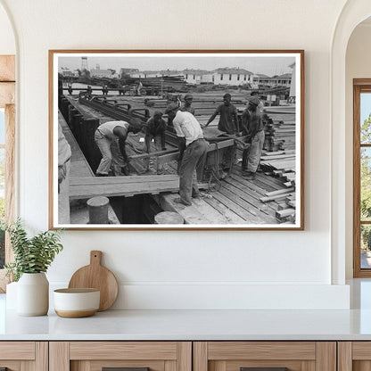 1938 Stevedores Loading Stove at Burwood Louisiana Waterfront - Available at KNOWOL