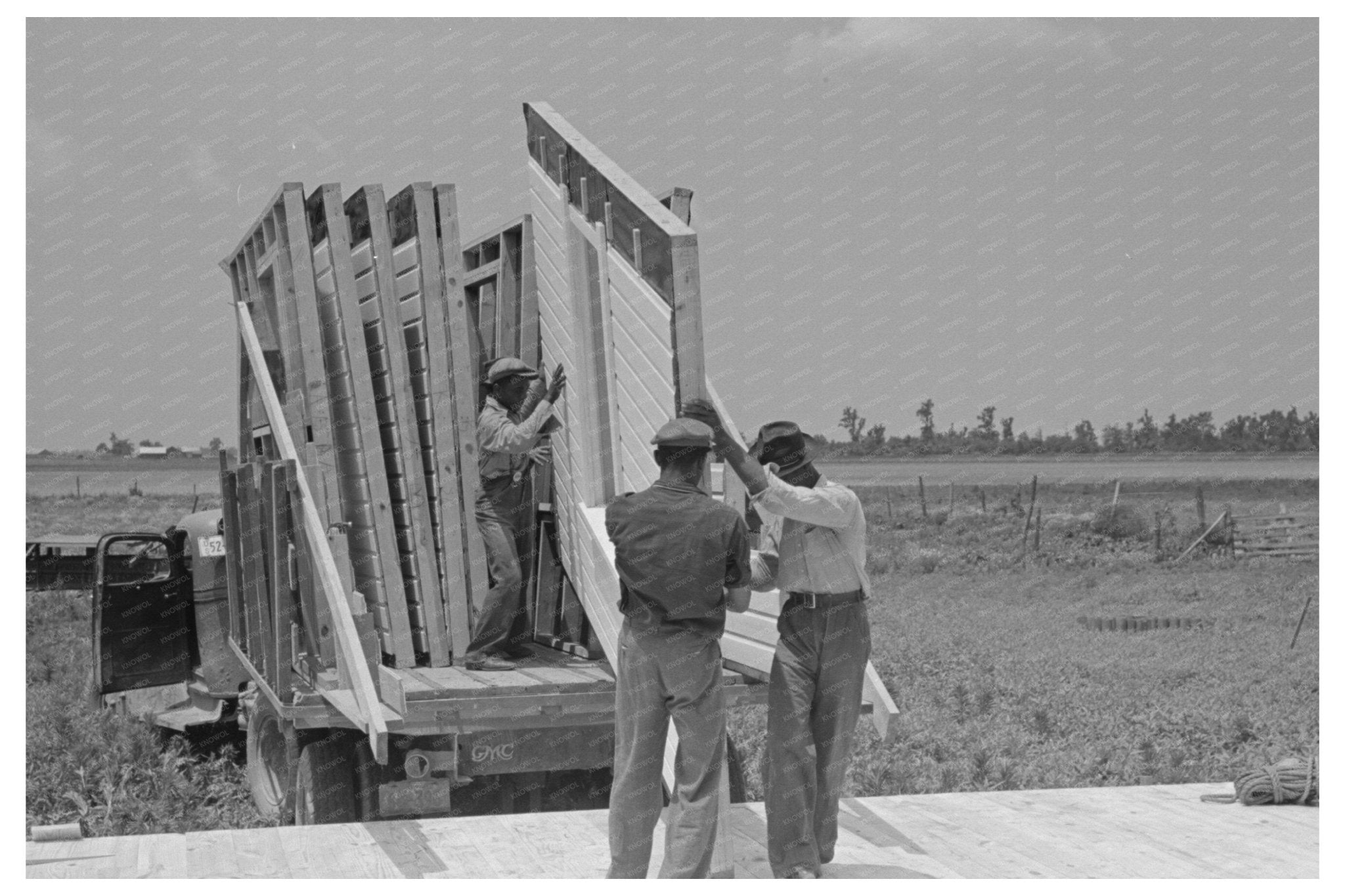 1938 Unloading Construction Panels Southeast Missouri Farms Project - Available at KNOWOL