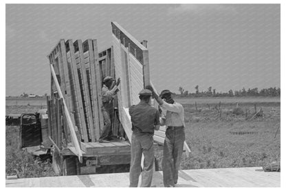 1938 Unloading Construction Panels Southeast Missouri Farms Project - Available at KNOWOL